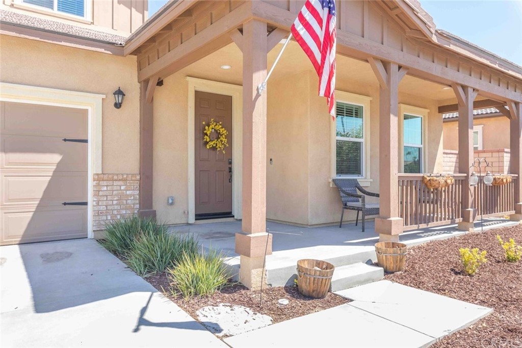 24802 Sandy Trail Place Menifee, CA 92584 - Photo 5 of 42 a front view of a house