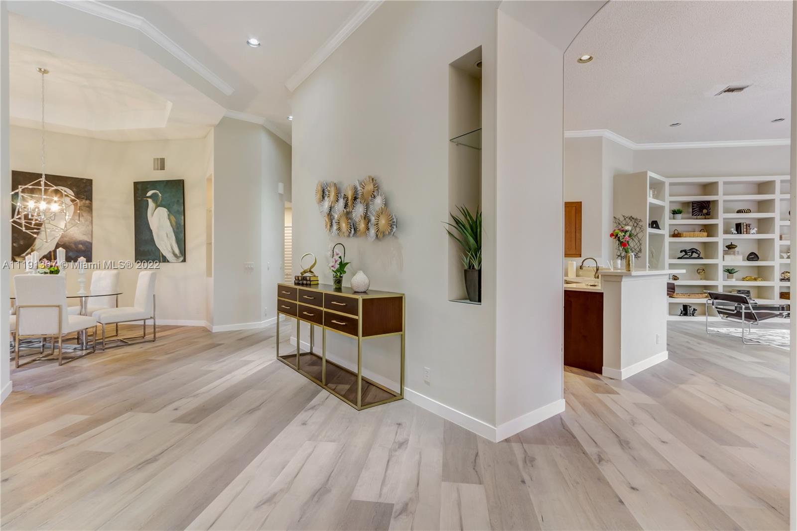 300 Mallard Road Weston, FL 33327 - Photo 18 of 46 a living room with furniture and wooden floor