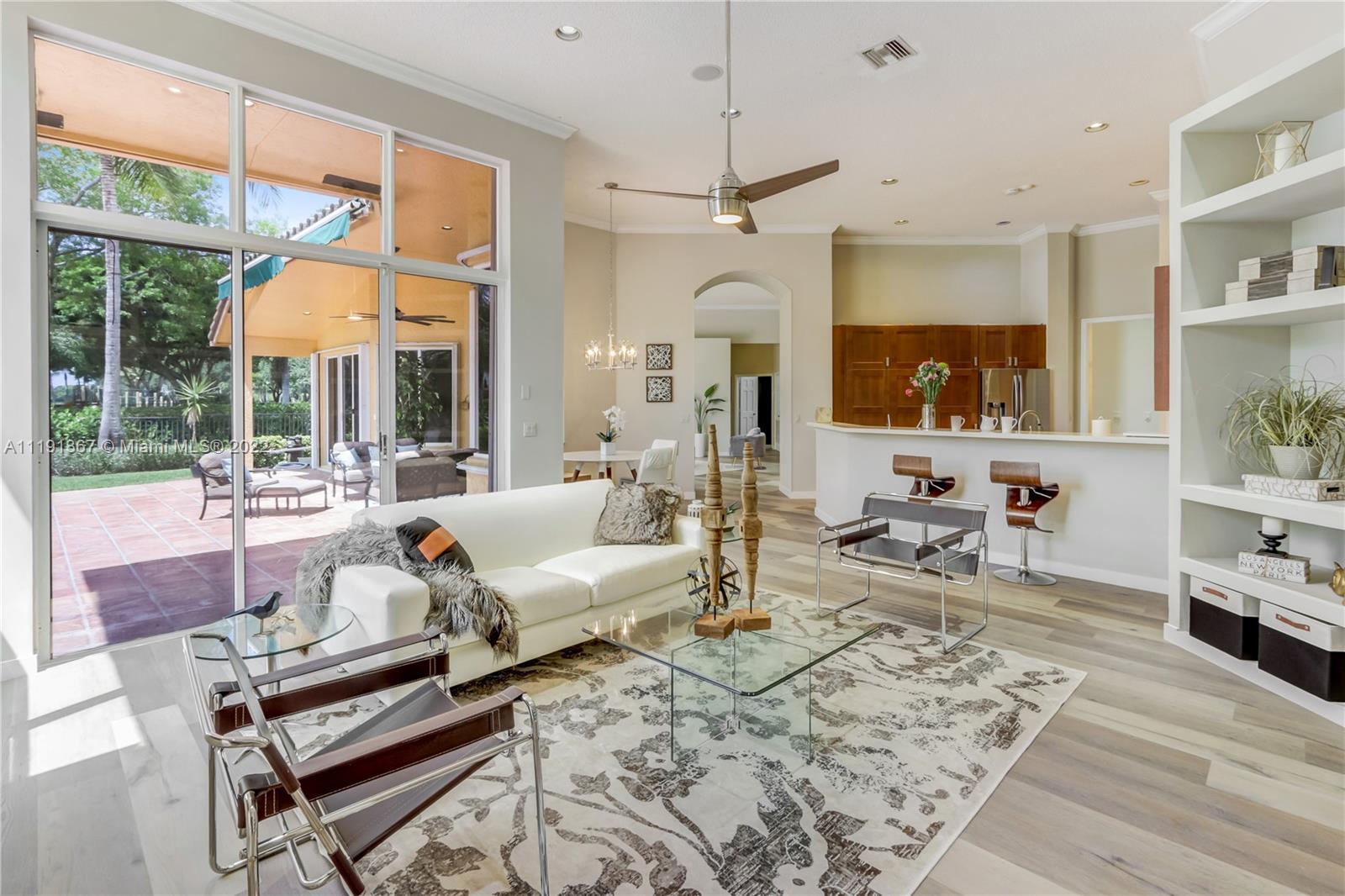 300 Mallard Road Weston, FL 33327 - Photo 21 of 46 a living room with furniture a table and large window