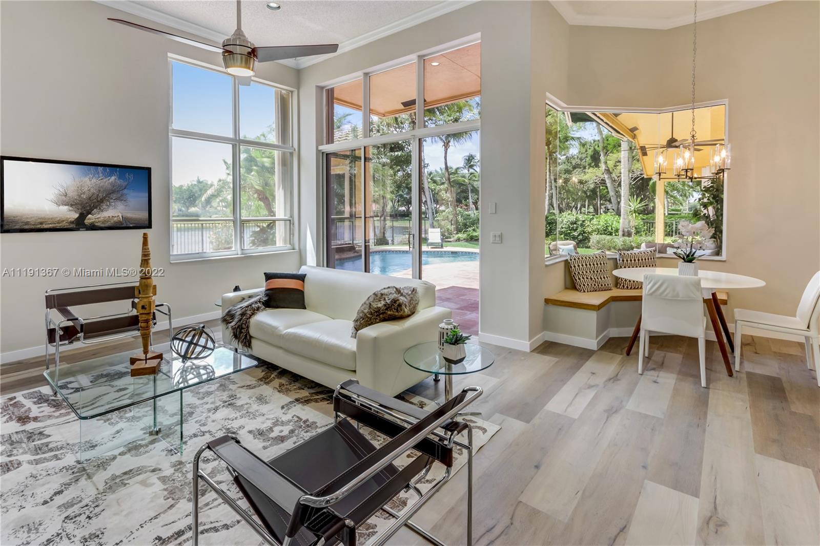 300 Mallard Road Weston, FL 33327 - Photo 23 of 46 a living room with furniture and a flat screen tv