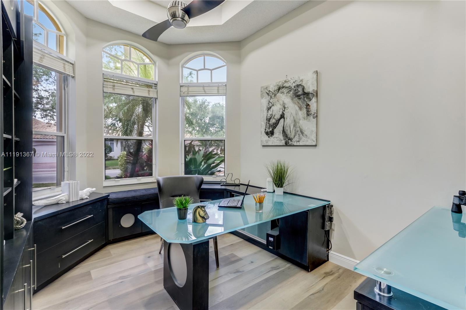 300 Mallard Road Weston, FL 33327 - Photo 34 of 46 a view of a workspace with furniture and a window