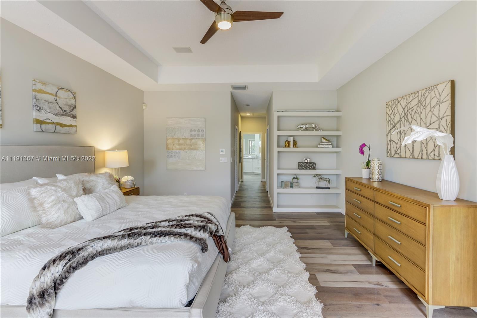 300 Mallard Road Weston, FL 33327 - Photo 36 of 46 a bedroom with a bed and a cabinets