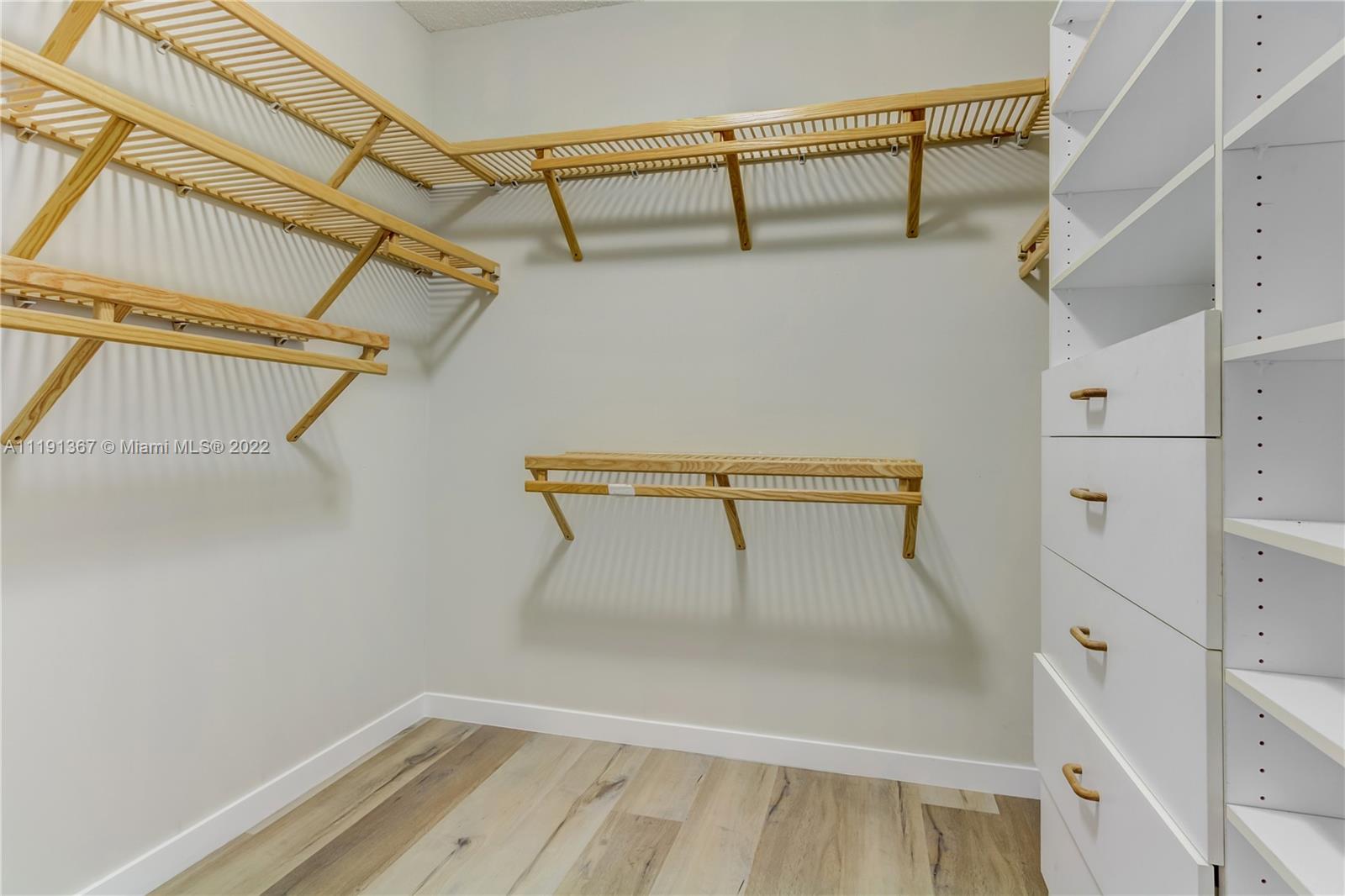 300 Mallard Road Weston, FL 33327 - Photo 39 of 46 a view of a room with racks on the wall