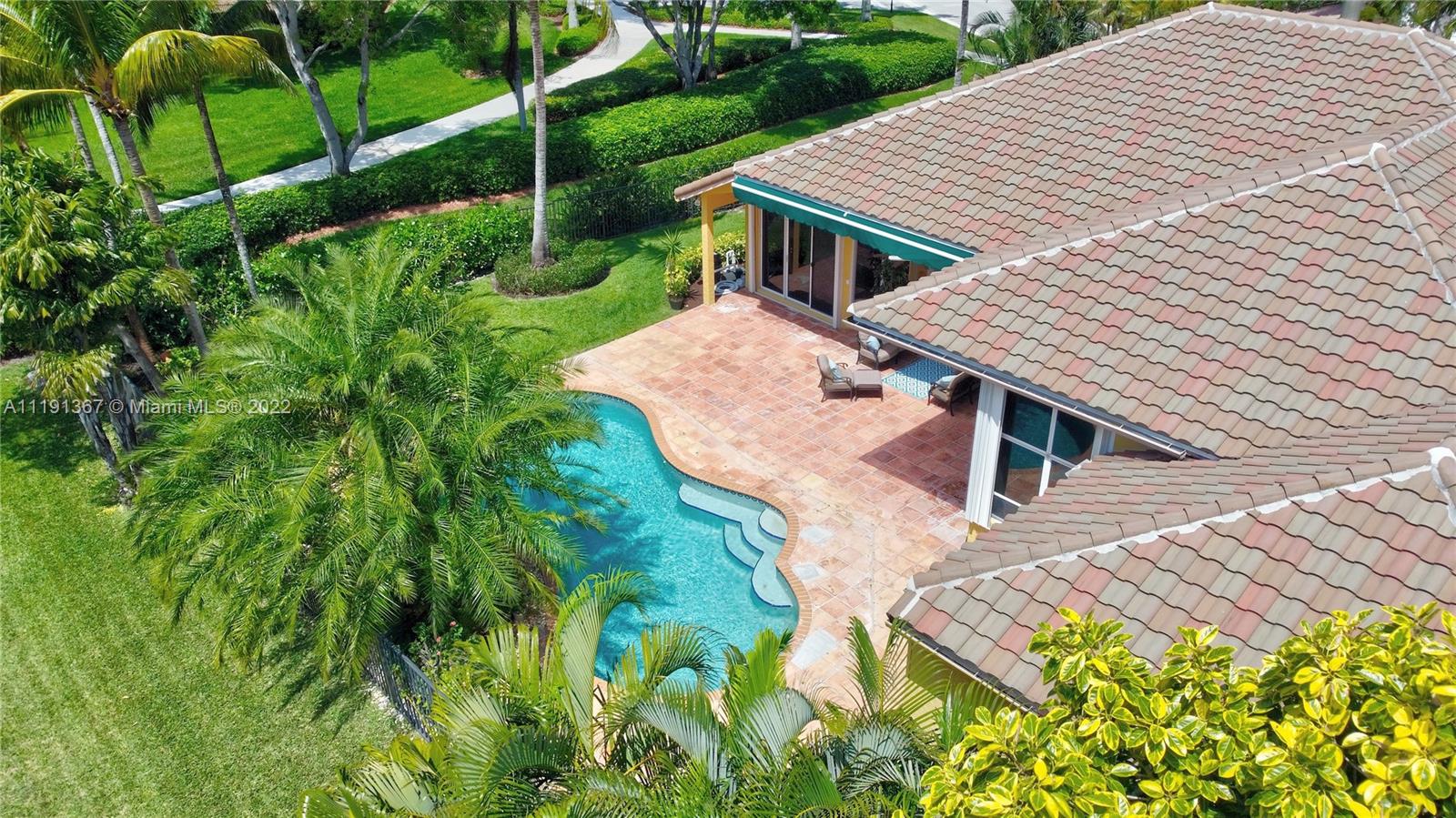 300 Mallard Road Weston, FL 33327 - Photo 45 of 46 a aerial view of a house with a yard