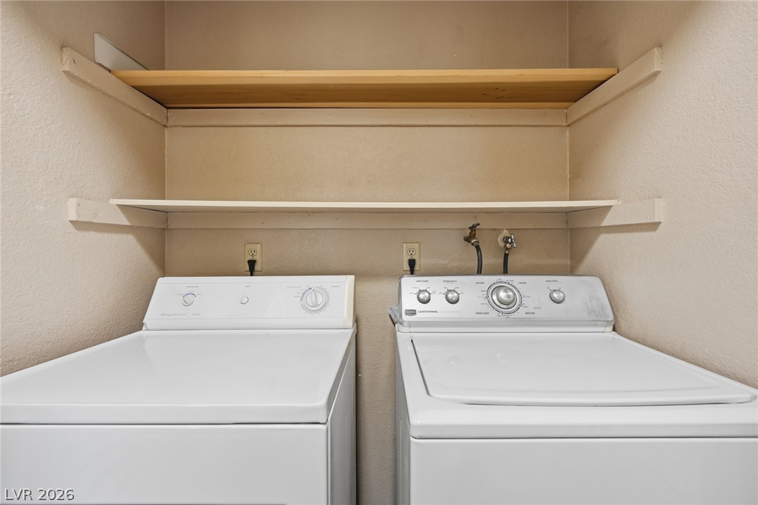 3971 Spring Leaf Drive Las Vegas, NV 89147 - Photo 21 of 48 Functional laundry nook includes a washer and dryer, ready for immediate use.