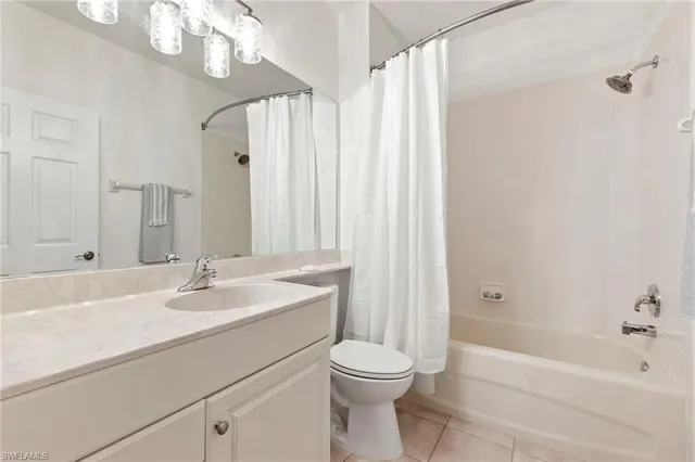 a bathroom with a sink a toilet and a bathtub