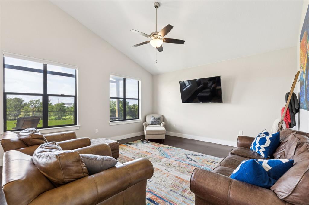 1430 Cr 2735 Decatur Tx 76234 Decatur, TX 76234 - Photo 4 of 13 Living room featuring high vaulted ceiling, a ceiling fan, and wood finished floors