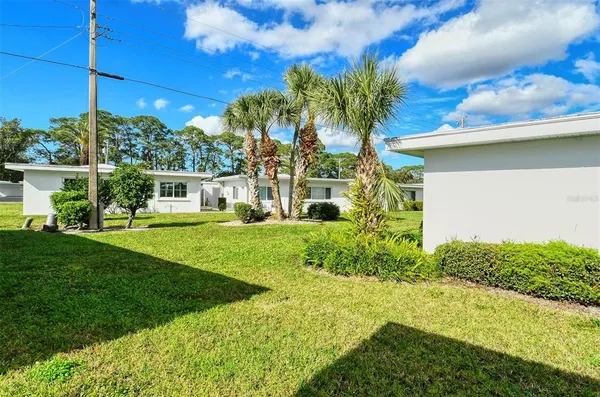 a house view with a garden space