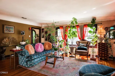 a living room filled with furniture and a couch