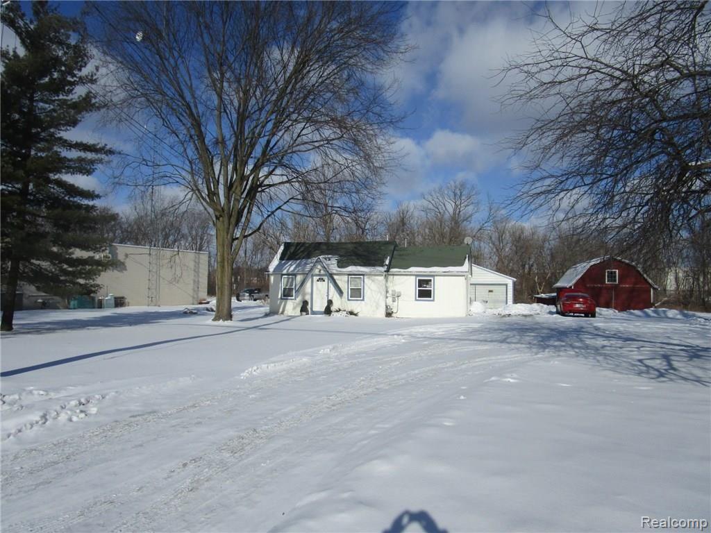 41454 Warren Road Canton, MI 48187 - Photo 5 of 11 41472 WARREN RD WITH PEAK OF GARAGE AND VIEW OF BARN