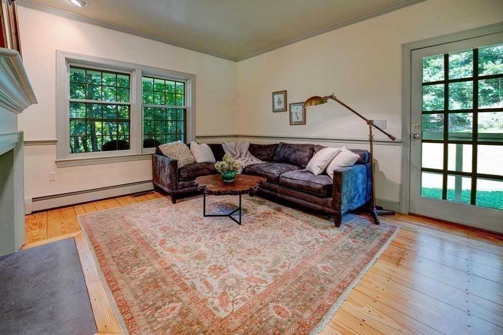 139 Stow Road Harvard, MA 01451 - Photo 16 of 42 a living room with furniture and a large window