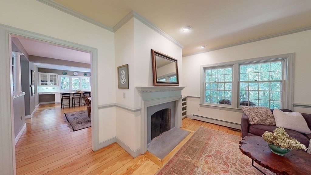 139 Stow Road Harvard, MA 01451 - Photo 17 of 42 a living room with furniture and a fireplace