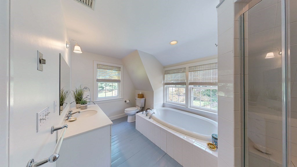 139 Stow Road Harvard, MA 01451 - Photo 22 of 42 a bathroom with a bathtub and a sink