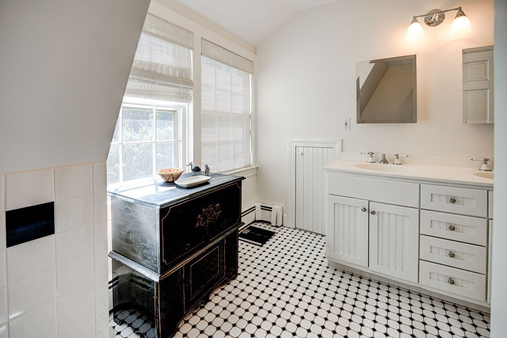 139 Stow Road Harvard, MA 01451 - Photo 26 of 42 a bathroom with a sink vanity and a mirror