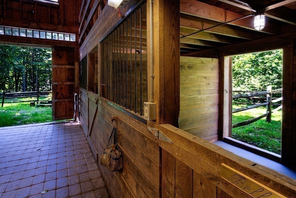 139 Stow Road Harvard, MA 01451 - Photo 34 of 42 a view of a porch with wooden floor and roof
