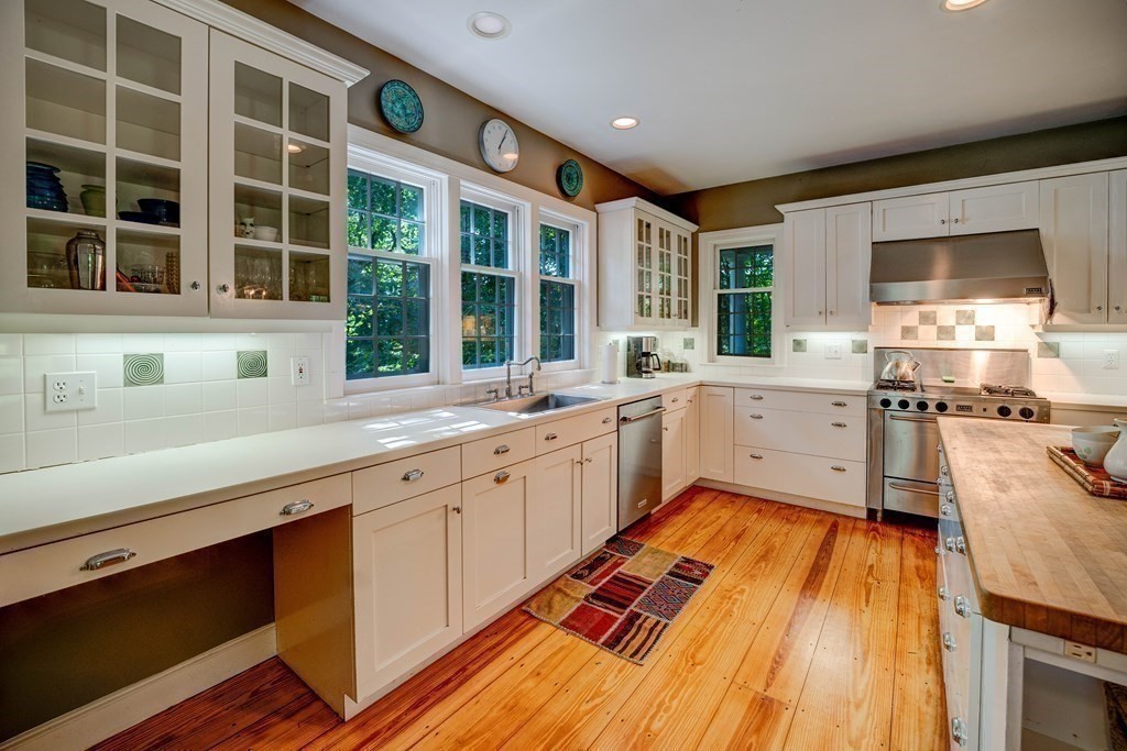 139 Stow Road Harvard, MA 01451 - Photo 8 of 42 a large white kitchen with a large window