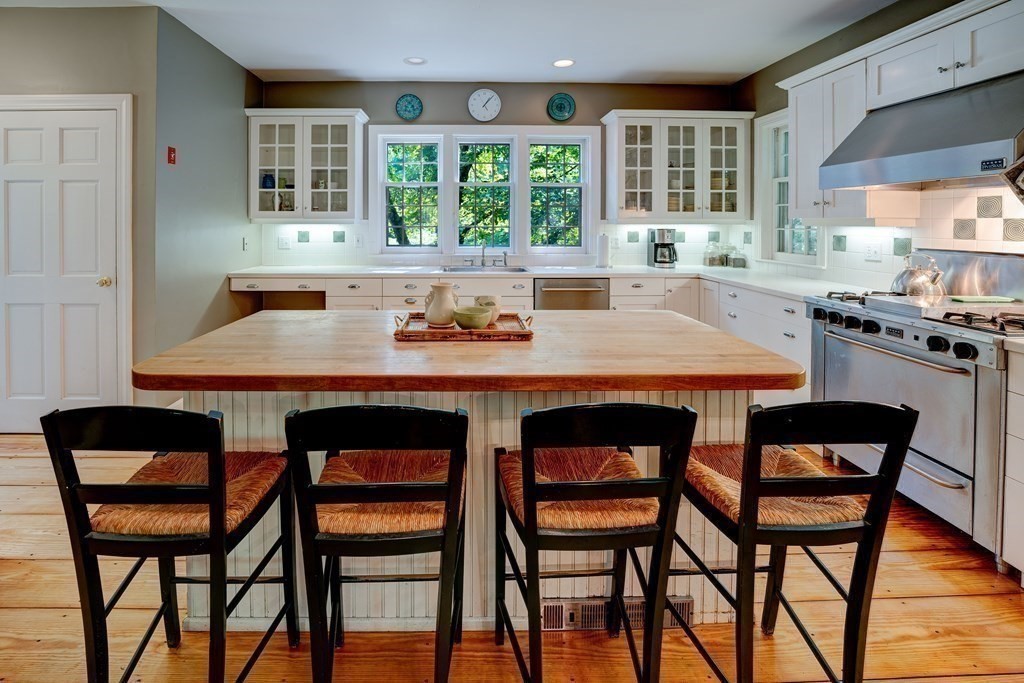139 Stow Road Harvard, MA 01451 - Photo 9 of 42 a dining table with chairs and window