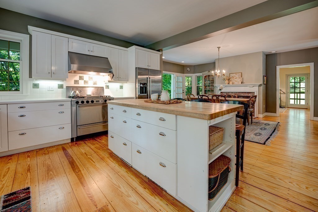 139 Stow Road Harvard, MA 01451 - Photo 10 of 42 a kitchen with cabinets a sink and appliances