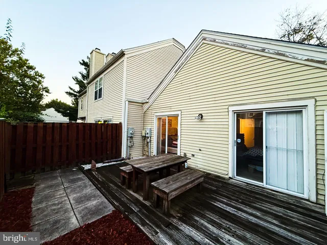 a view of a back yard of the house