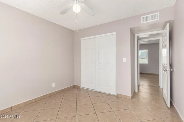 an empty room with a bathroom