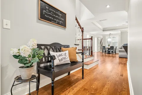 a view of a dining room with furniture and window
