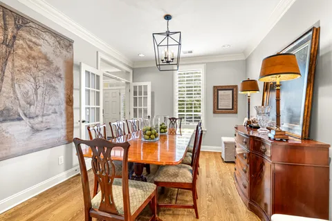 a kitchen with stainless steel appliances granite countertop a stove and cabinets
