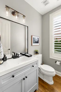 a spacious bedroom with a large bed and a window