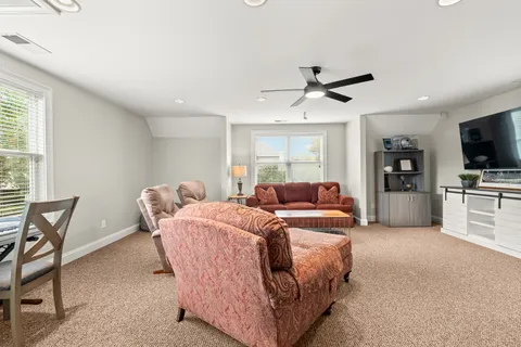 a view of a patio with a table and chairs