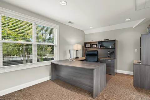 a outdoor space with lots of tables and chairs