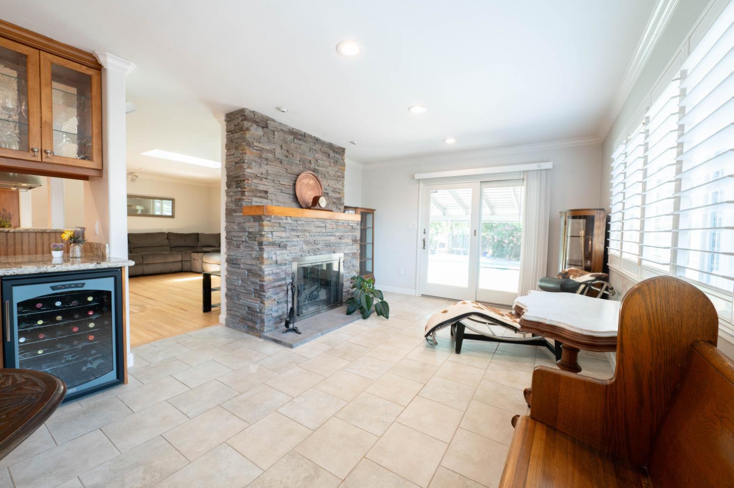 4530 Bela Way Carmichael, CA 95608 - Photo 11 of 36 Gorgeous fireplace! Wine fridge stays.