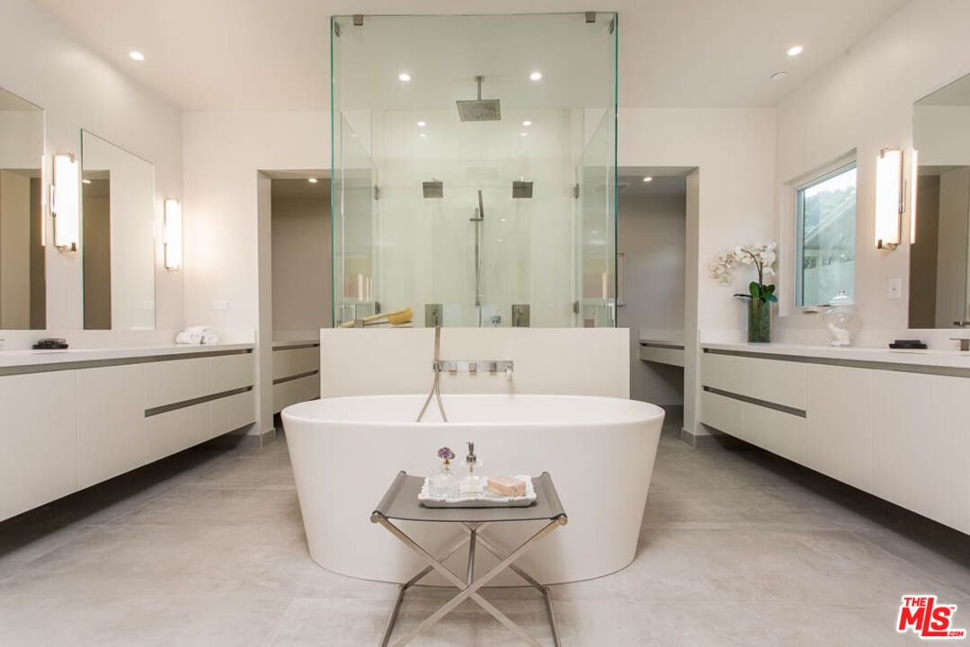 1621 Malcolm Avenue, Unit 101 Los Angeles, CA 90024 - Photo 18 of 34 a large dining space with a table and chairs