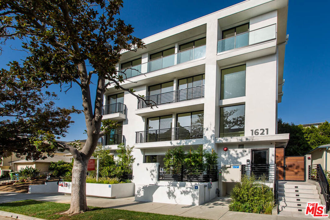 1621 Malcolm Avenue, Unit 101 Los Angeles, CA 90024 - Photo 2 of 34 a front view of a building with street view