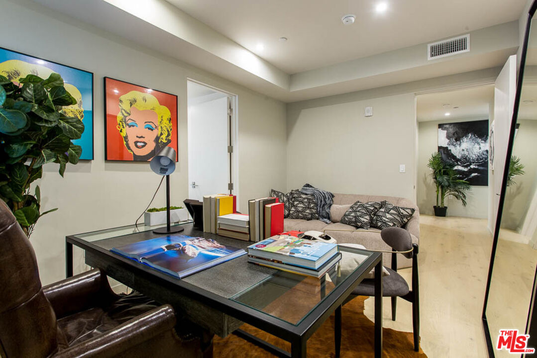 1621 Malcolm Avenue, Unit 101 Los Angeles, CA 90024 - Photo 25 of 34 a view of a workspace with furniture