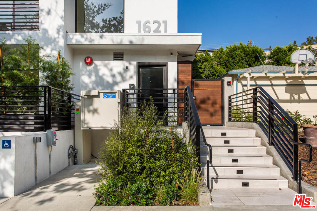 1621 Malcolm Avenue, Unit 101 Los Angeles, CA 90024 - Photo 4 of 34 a front view of a house with a garage