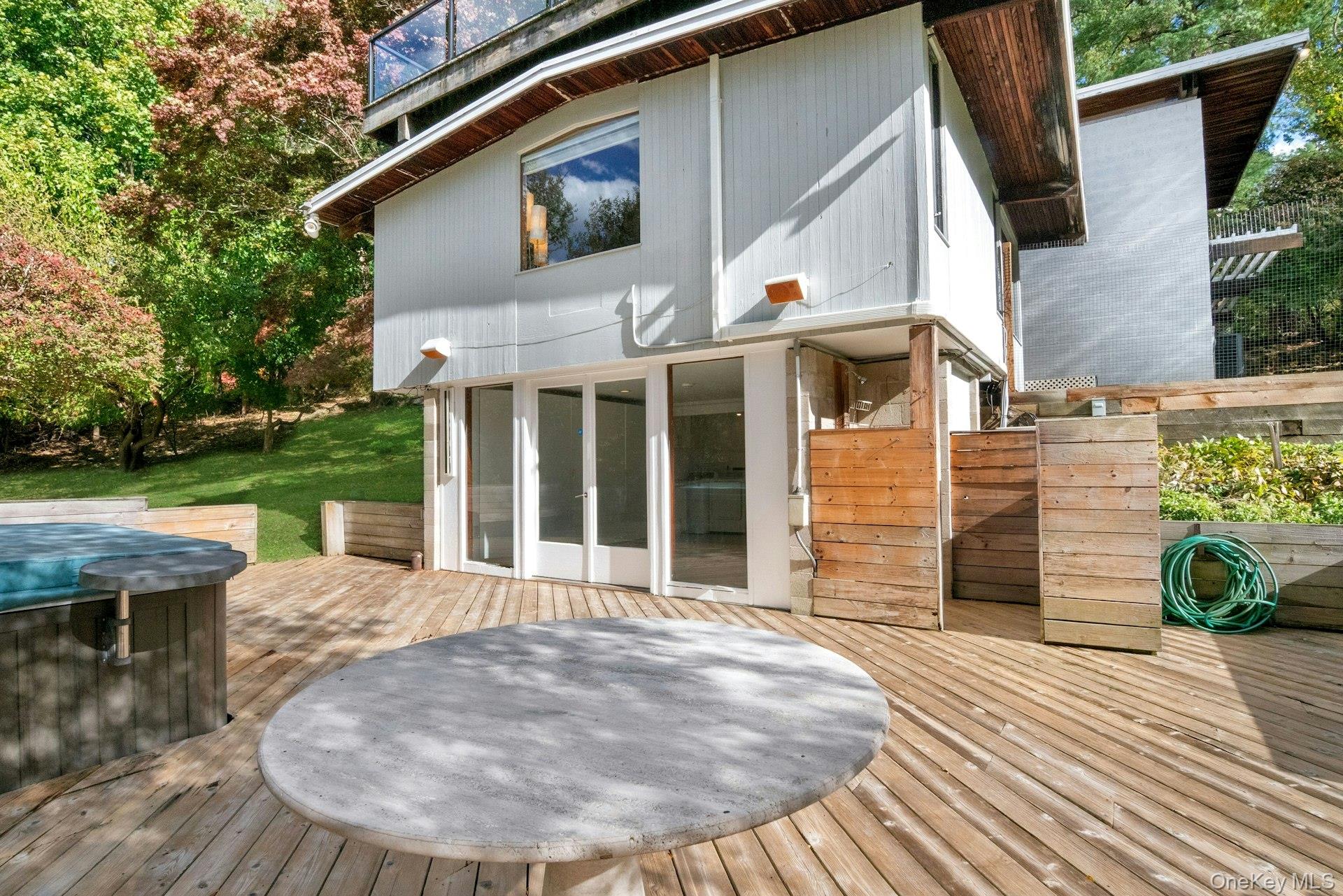 309 Scarborough Road Briarcliff Manor, NY 10510 - Photo 38 of 50 a view of a house with backyard and garden