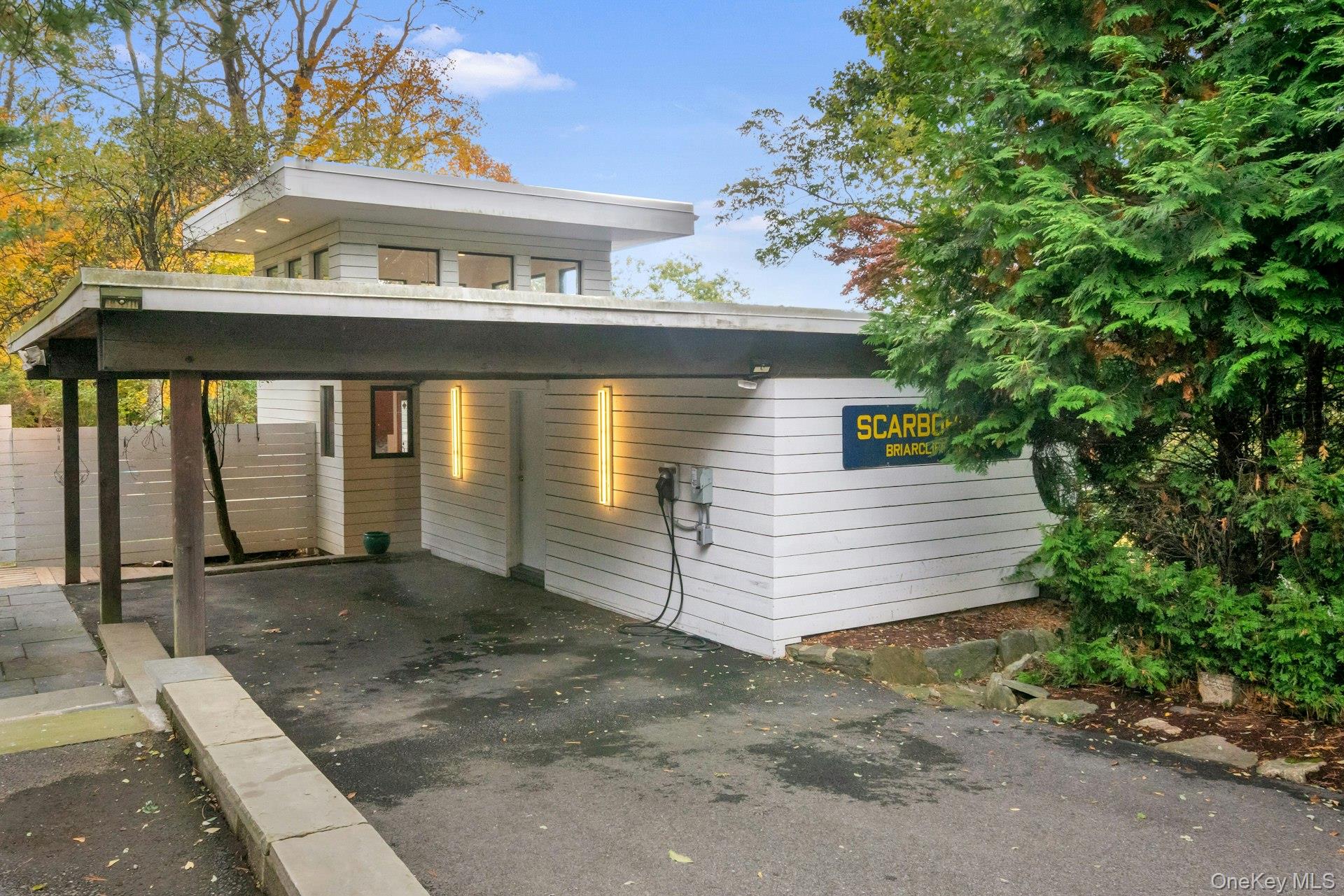 309 Scarborough Road Briarcliff Manor, NY 10510 - Photo 46 of 50 a view of a house with a yard