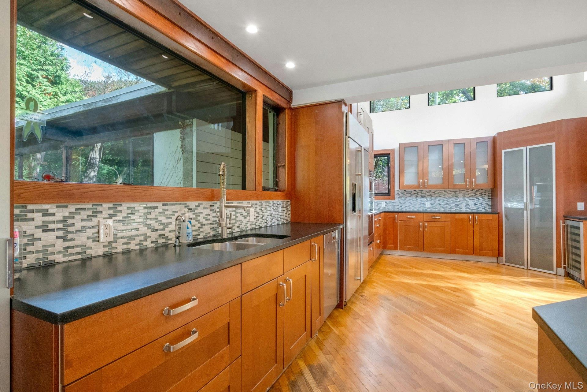 309 Scarborough Road Briarcliff Manor, NY 10510 - Photo 6 of 50 a view of a bathroom with a tub and shower