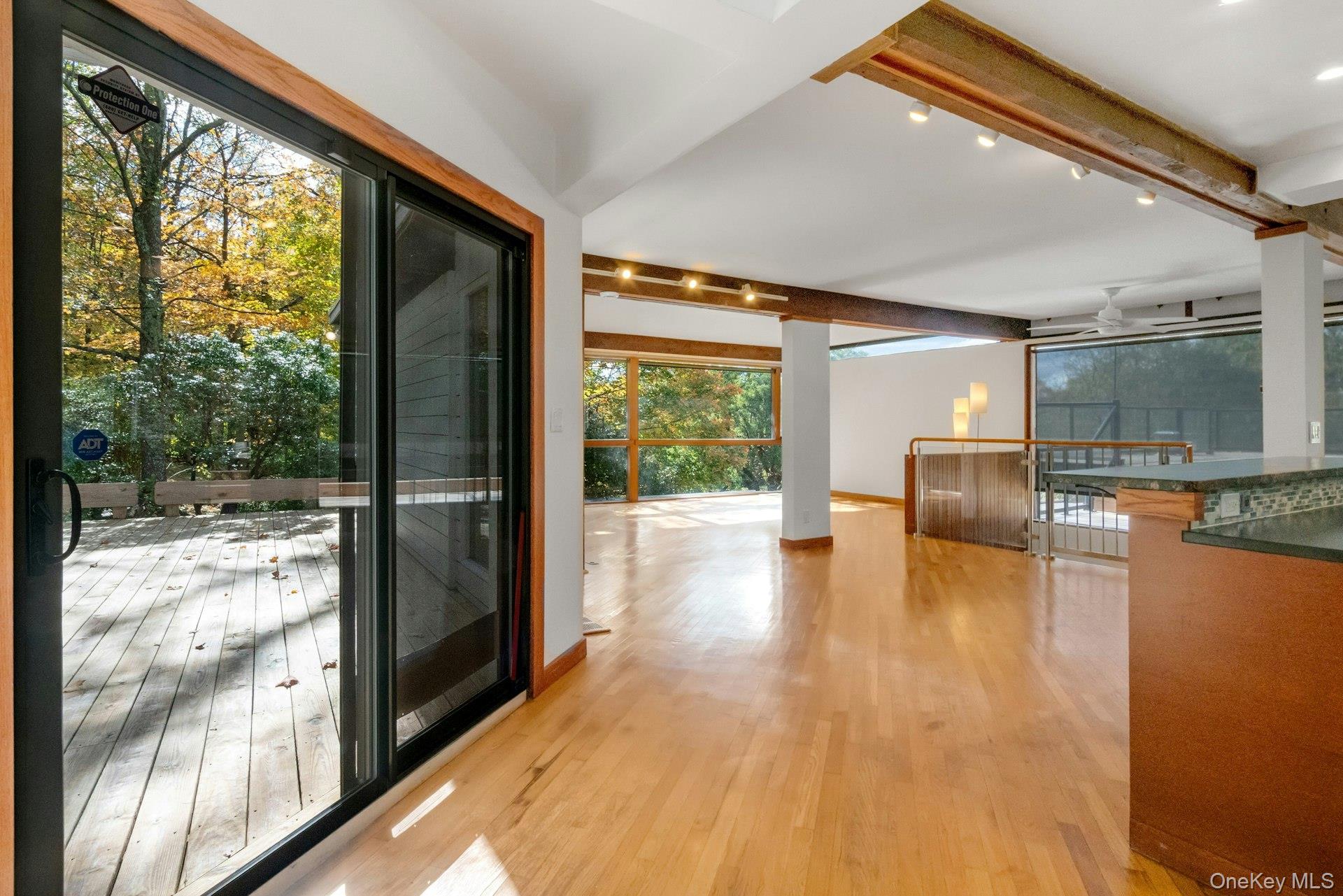 309 Scarborough Road Briarcliff Manor, NY 10510 - Photo 8 of 50 a view of a living room with hardwood floor and a large window