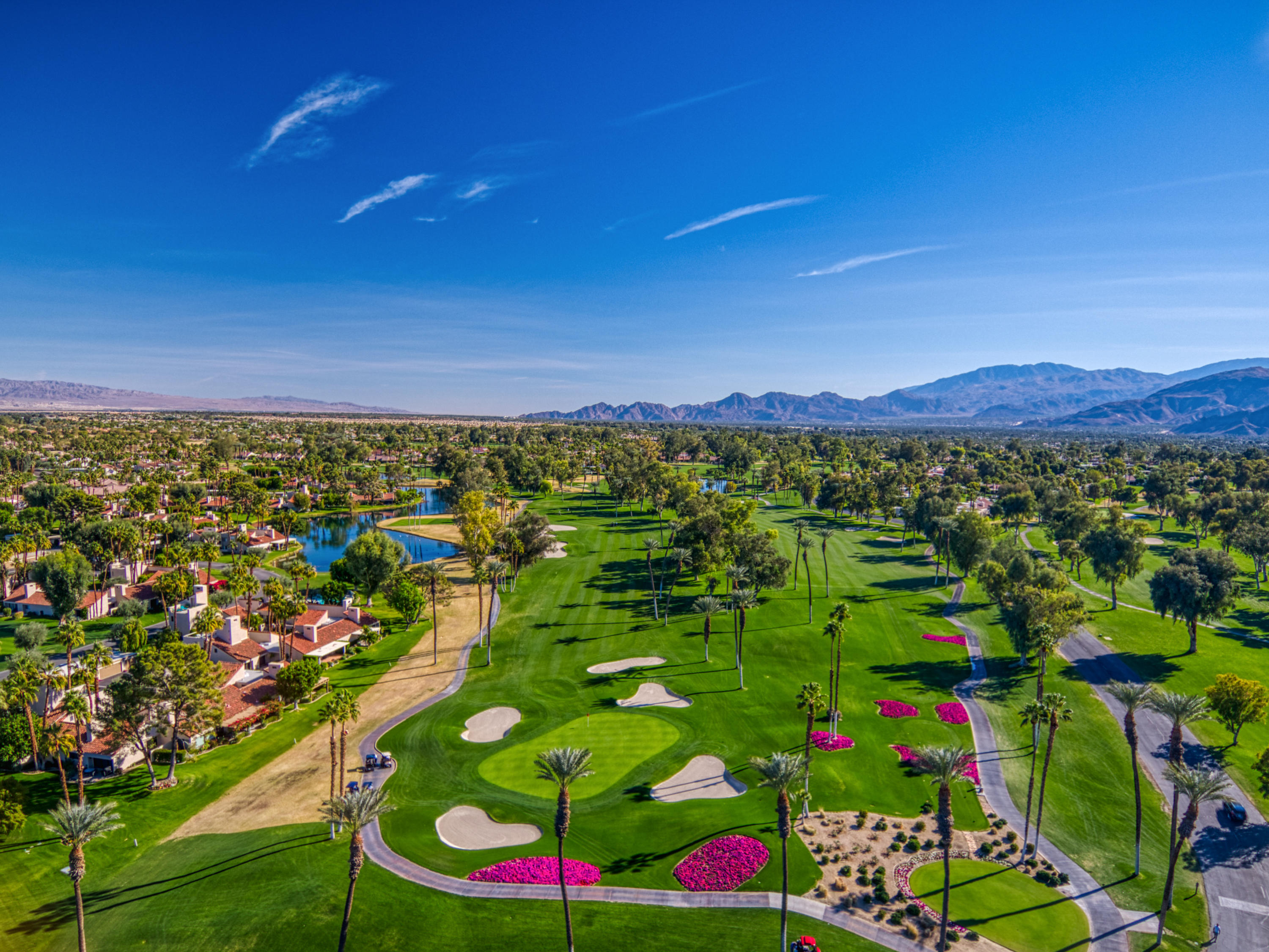 13 Wimbledon Circle Rancho Mirage, CA 92270 - Photo 14 of 62 a view of an outdoor space with a lake view