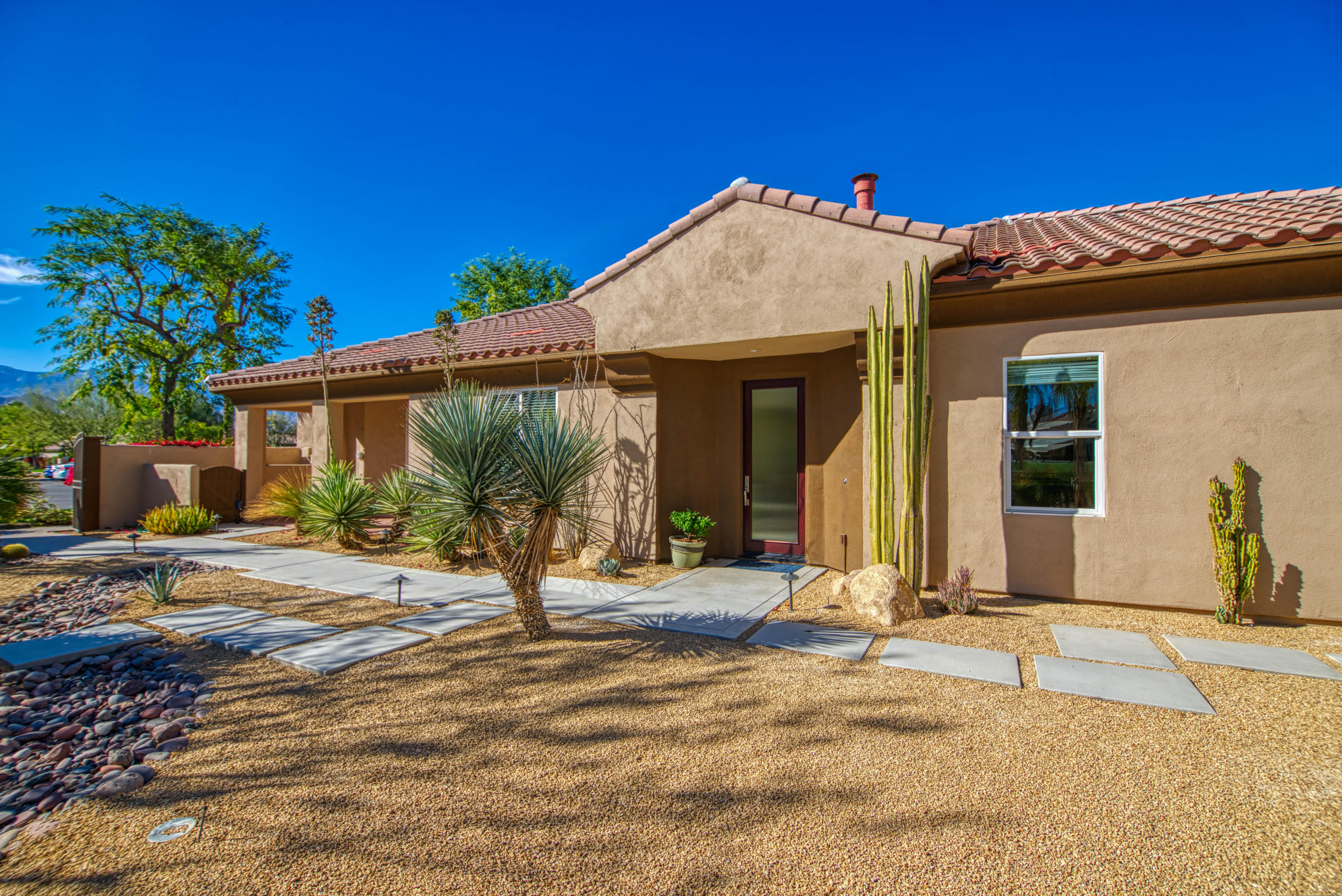 13 Wimbledon Circle Rancho Mirage, CA 92270 - Photo 22 of 62 a view of a house with a patio