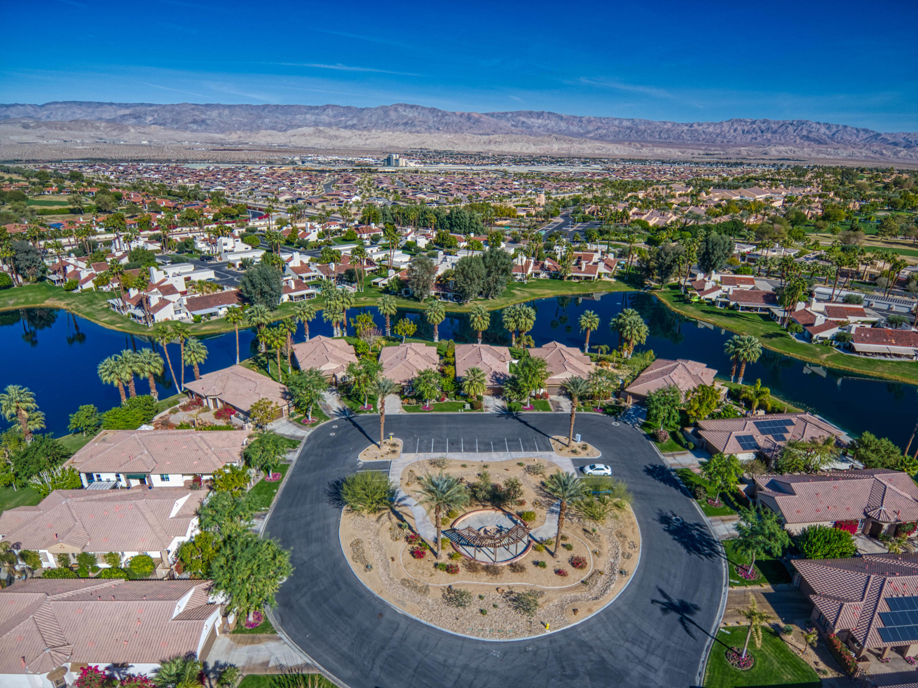 13 Wimbledon Circle Rancho Mirage, CA 92270 - Photo 7 of 62 an aerial view of residential houses with outdoor space