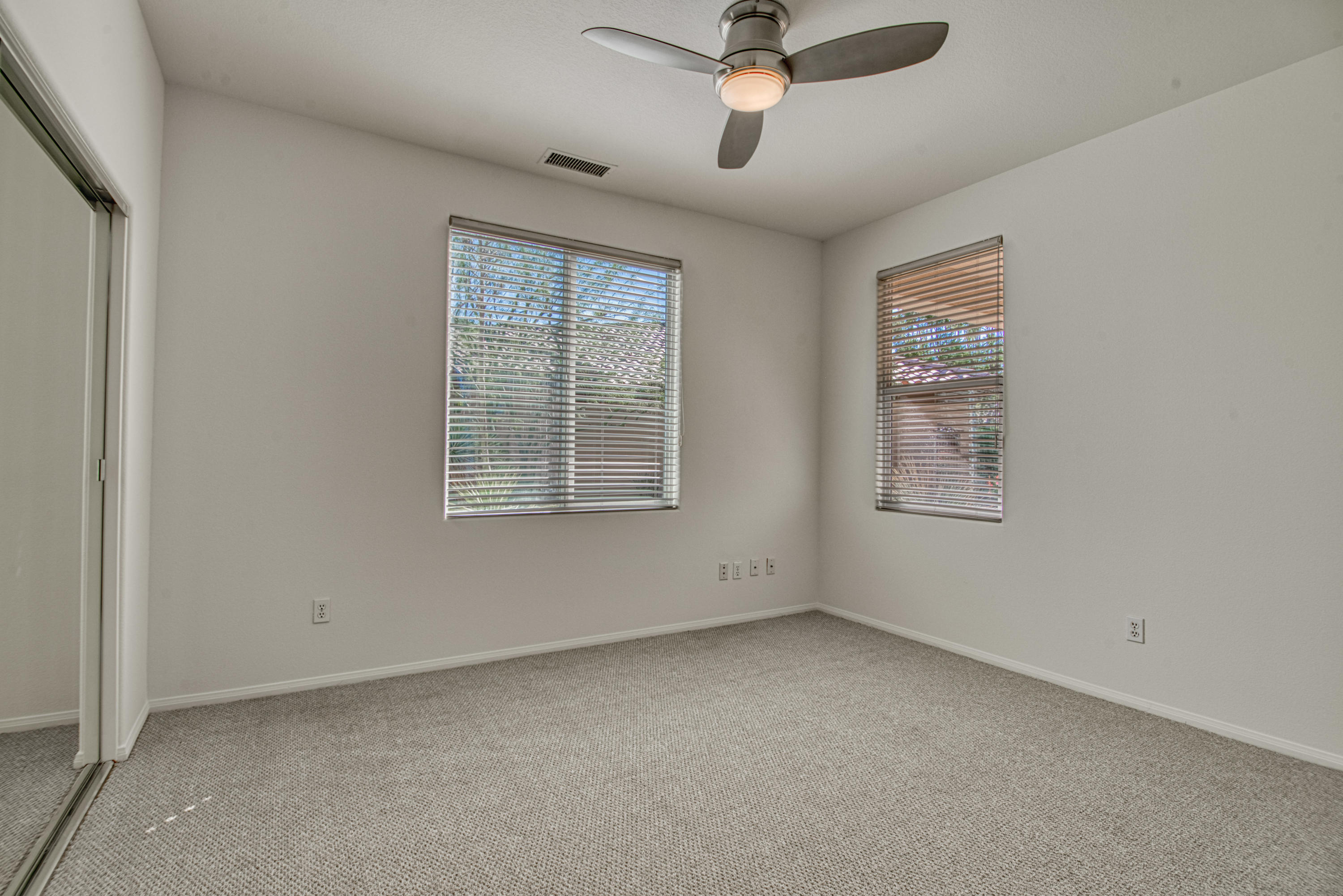 13 Wimbledon Circle Rancho Mirage, CA 92270 - Photo 61 of 62 a view of an empty room with a window
