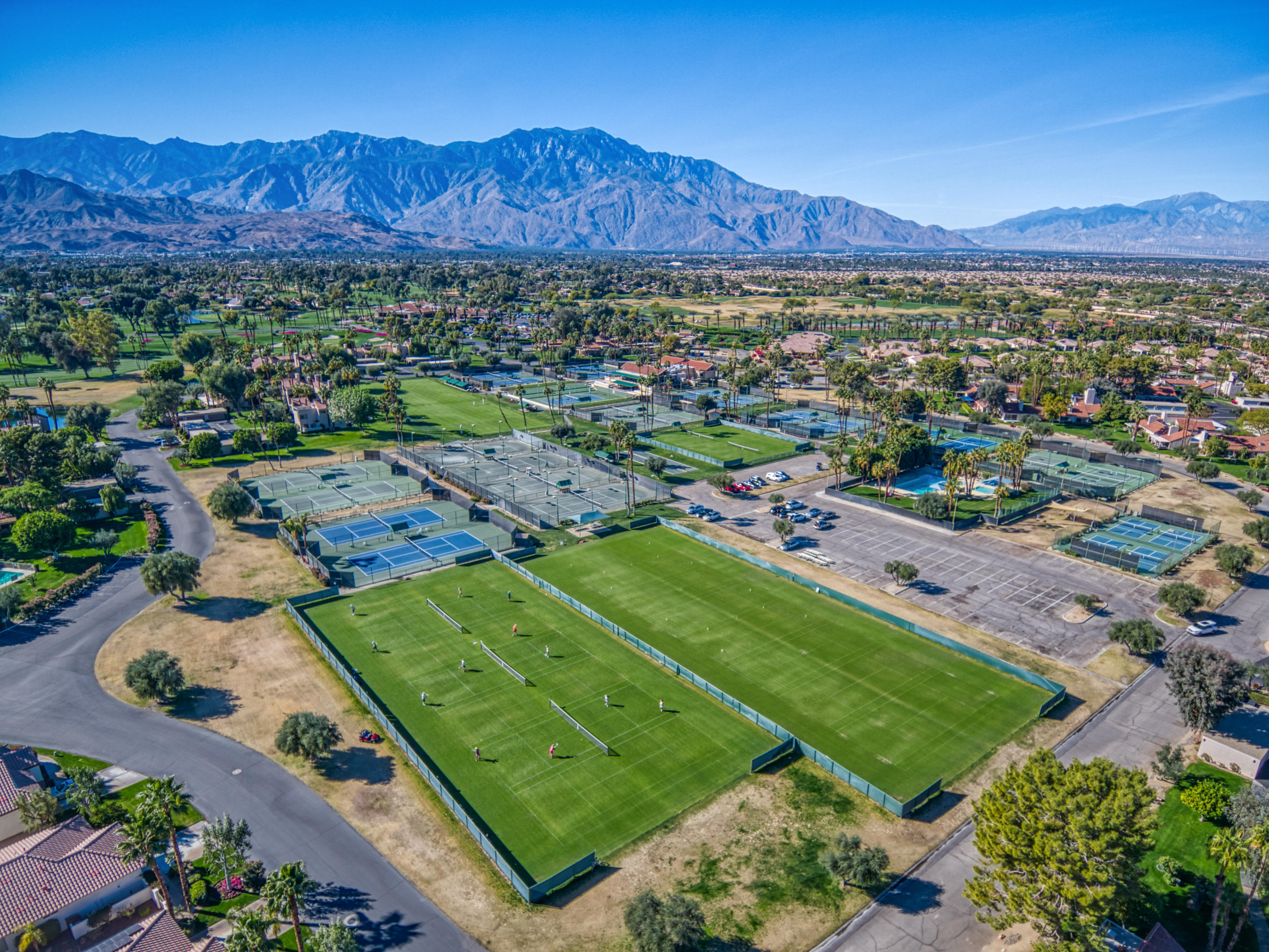 13 Wimbledon Circle Rancho Mirage, CA 92270 - Photo 8 of 62 an aerial view of residential houses and outdoor space