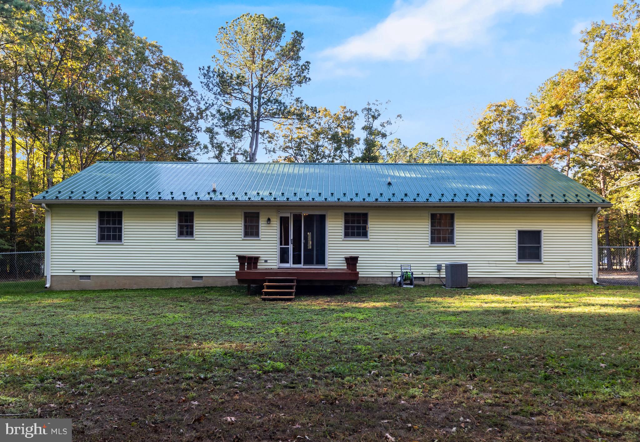 45810 Aberdeen Road Valley Lee, MD 20692 - Photo 23 of 32 Rear of home; vinyl siding and metal roof