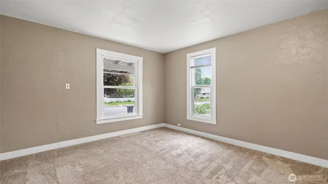 an empty room with windows