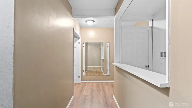 a bathroom with a tub and shower