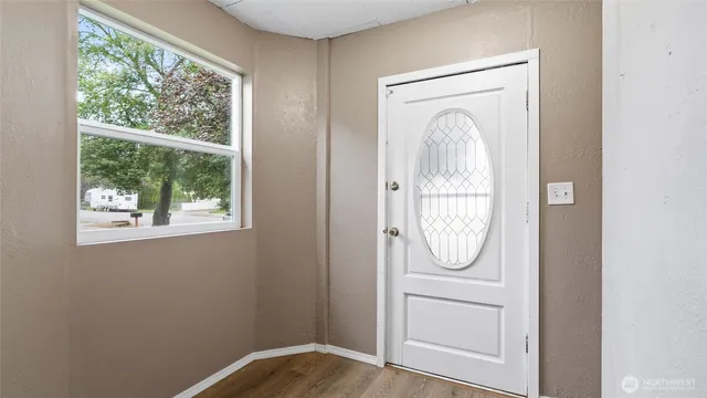 a front view of a house with mirror gate