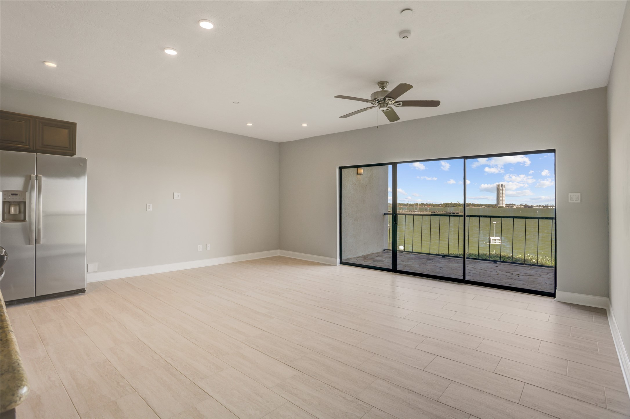 351 Lakeside Lane, Unit 102 Houston, TX 77058 - Photo 2 of 14 a view of an empty room with a window