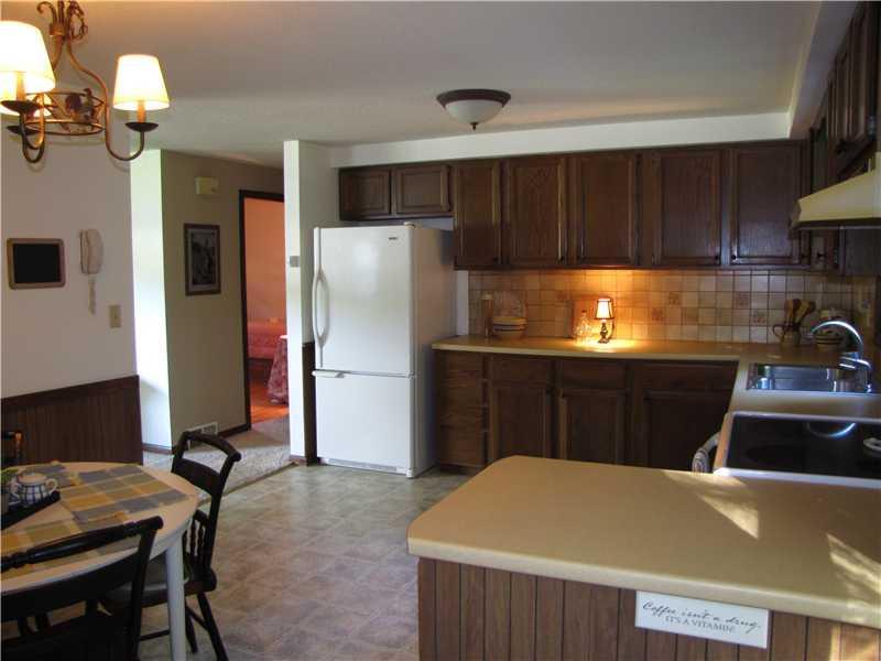 12 Indian Ridge Street Augusta, ME 04330 - Photo 3 of 25 Kitchen. Newer appliances & flooring .