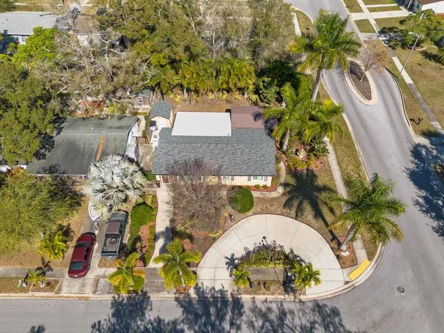 a view of a house with a garden